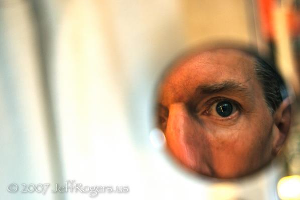 Jeff Rogers in small mirror